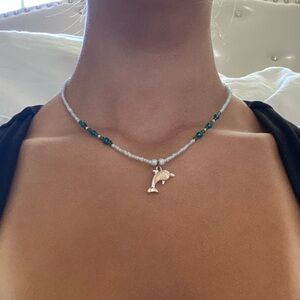 beaded necklace with charm detail
